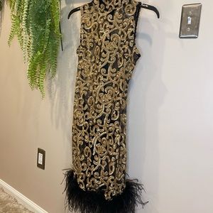 Gold and Black See through mini dress with feather trim
